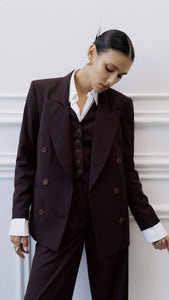 brown blazer and a waistcoat for women