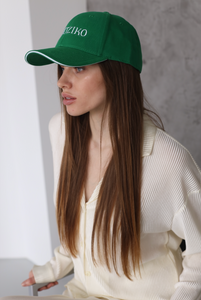green cap hat
